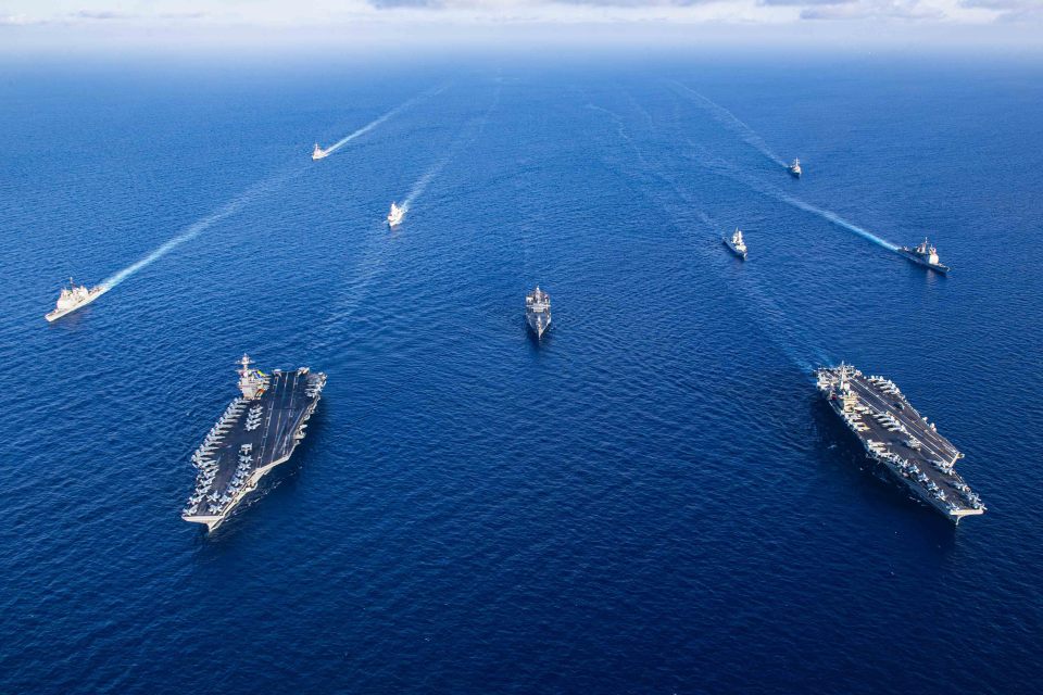 An aerial view of aircraft carriers of the United States Navy USS Gerald R. Ford and USS Dwight D. Eisenhower together earlier in November