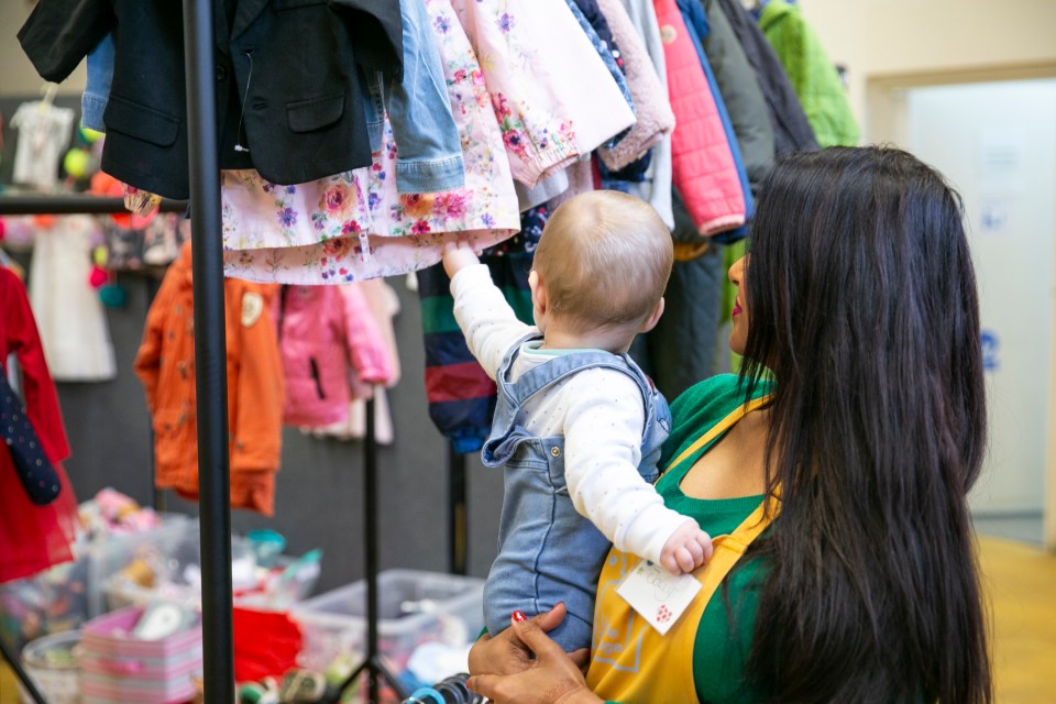 A mum and baby find help at a baby bank in North London