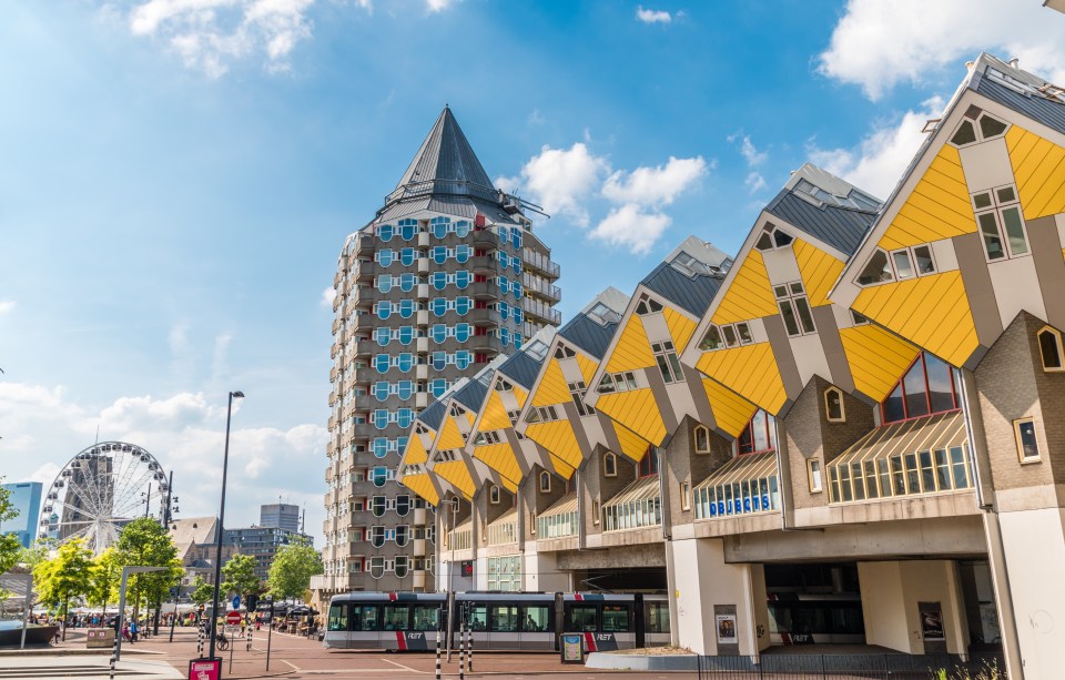 The city was destroyed during WW2 but has been rebuilt, pictured above the famous Cube Houses