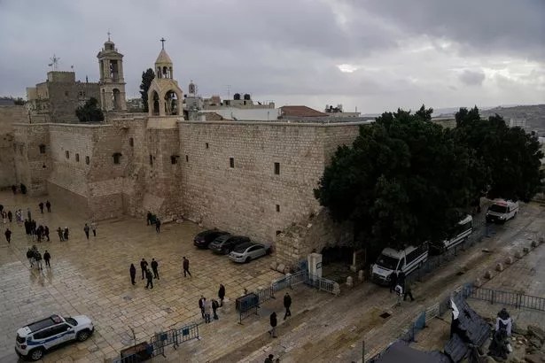 Manger Square, next to the Church and the home of the Nativity, is virtually empty