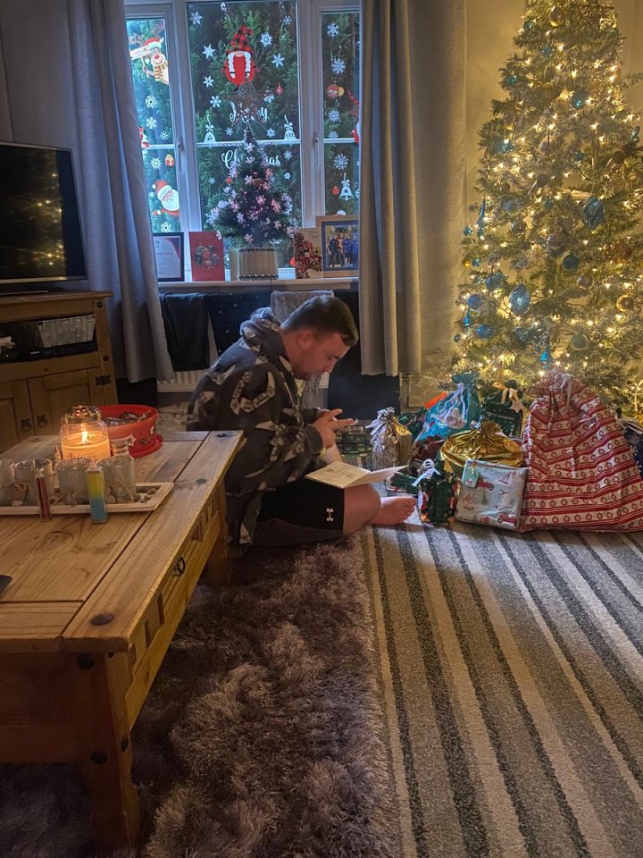 Luke Littler's mum shared a photo of him opening some Christmas gifts