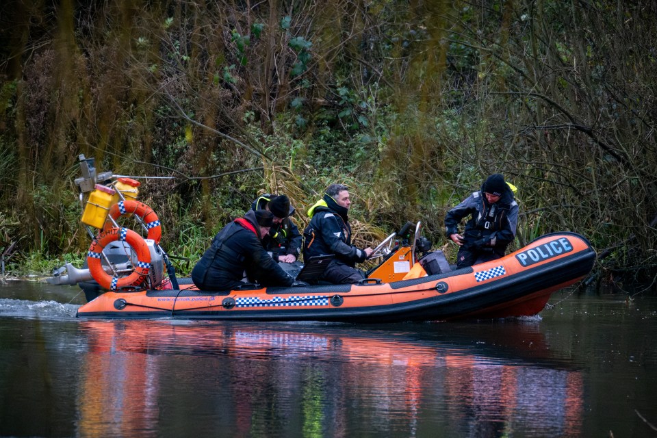 Divers were today scouring the river for the missing mum