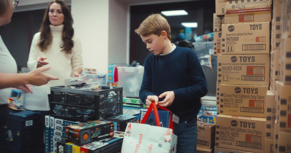 Prince George helped staff sort through toys