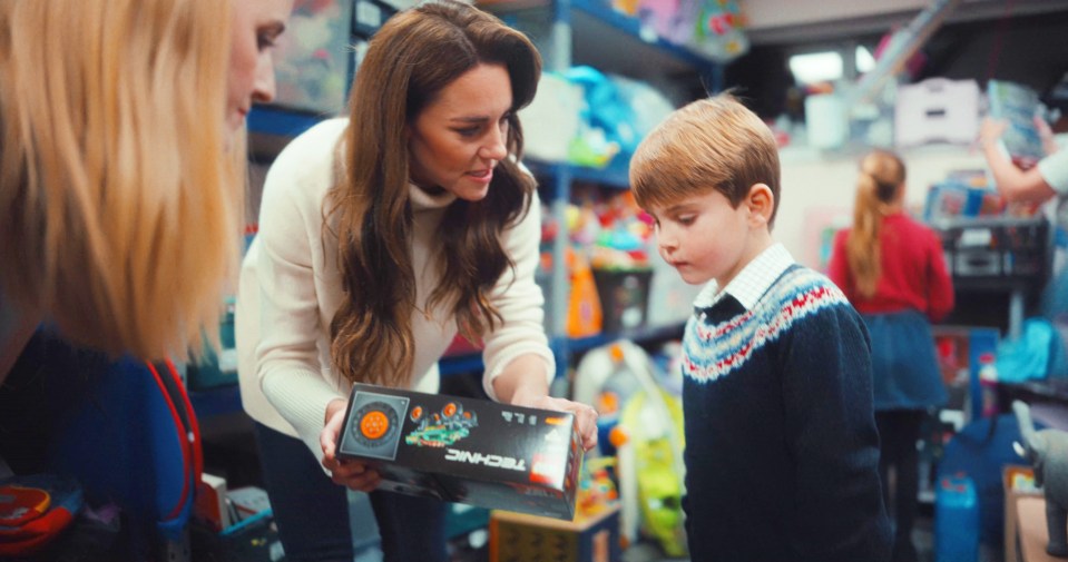 Princess Kate with Prince Louis as they volunteered at a baby bank