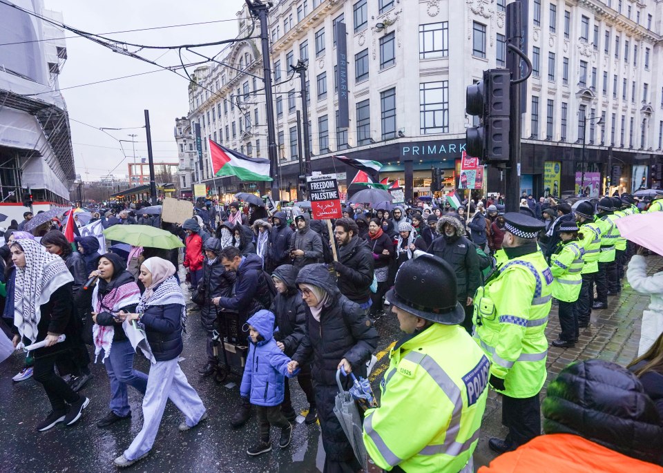 Pro-Palestinian protesters march through the streets of Manchester