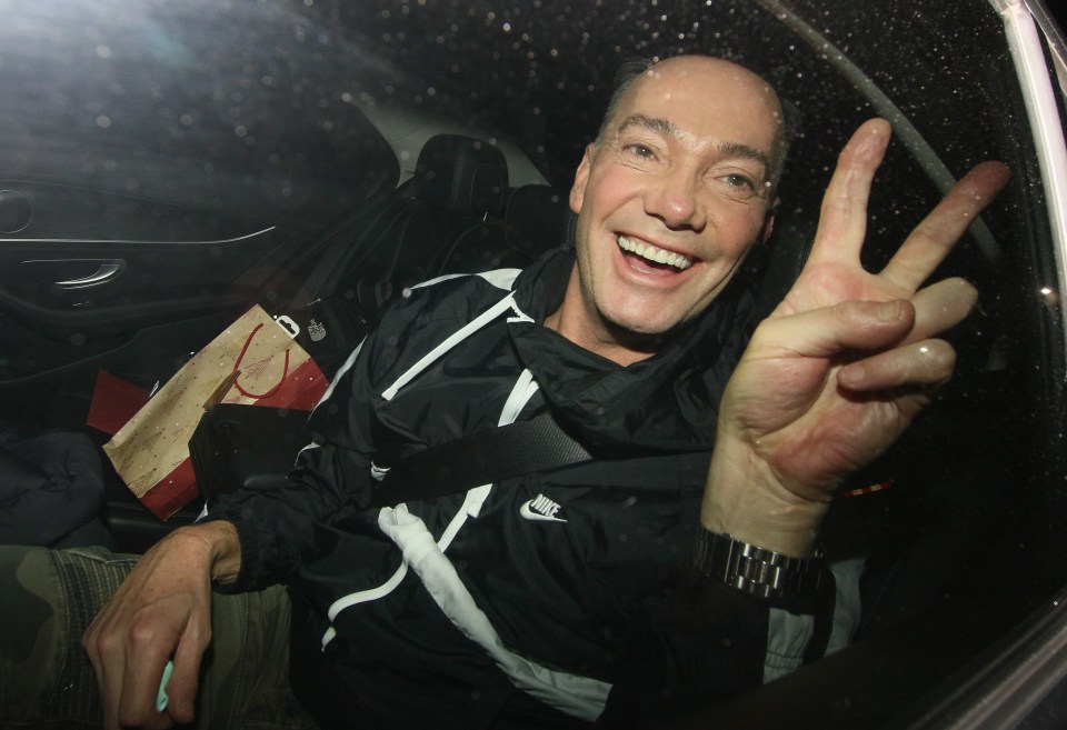 Craig Revel Horwood made a peace sign for the camera