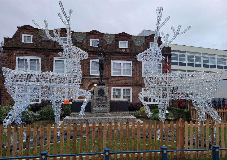 The sculptures are positioned so their rear ends face out towards passers-by