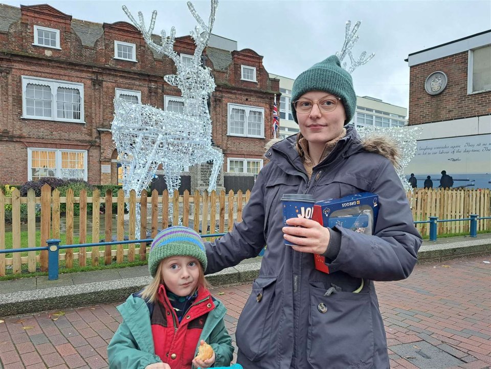 Alice Ferry, with her son Rory Murphy, says the sculptures are 'pretty'