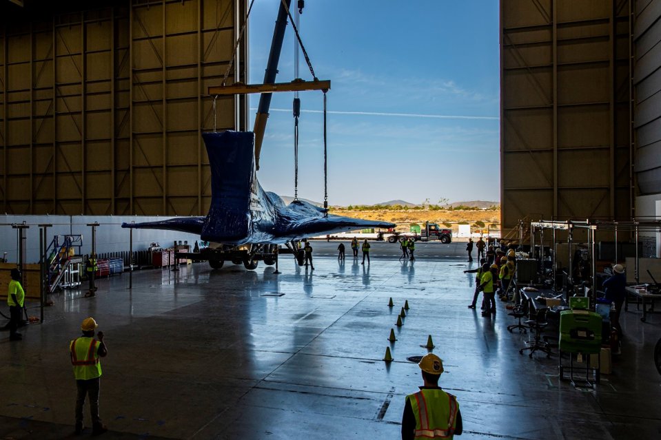 The X-59 is lowered to the ground at Lockheed Martin's Skunk Works facility in Palmdale, California last year