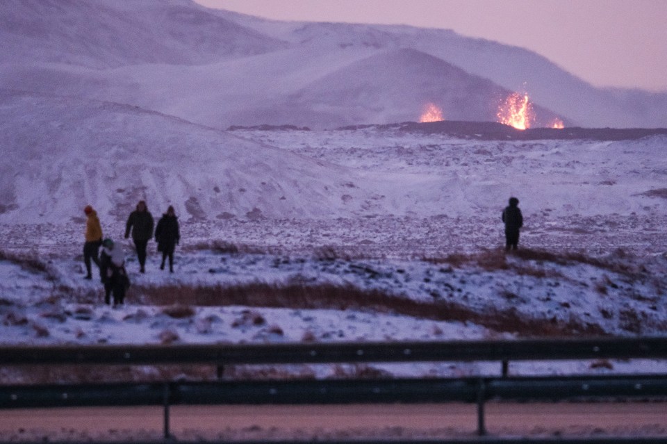 Lava continues to spew from the Sundhnuks crater near the town of Grindavik following Monday night's eruption