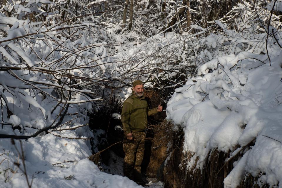 Ukrainian troops look half frozen as they soldier on through minus temperatures