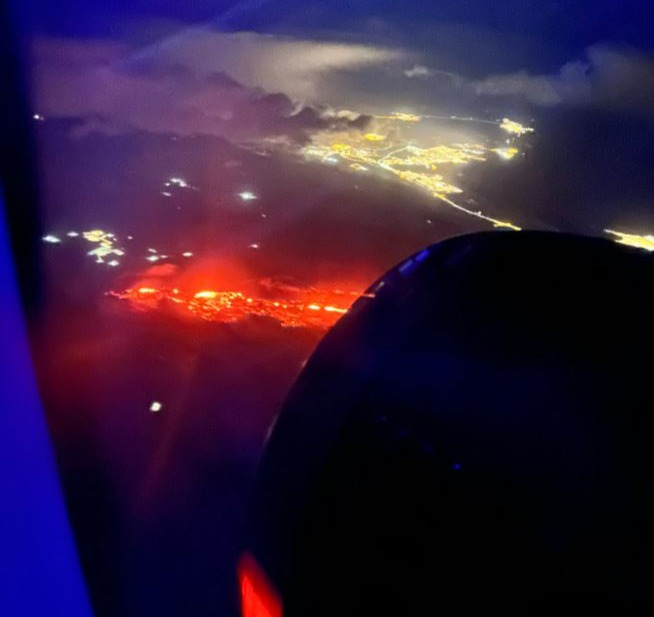 Molten red lava illuminated the sky as the volcano erupted