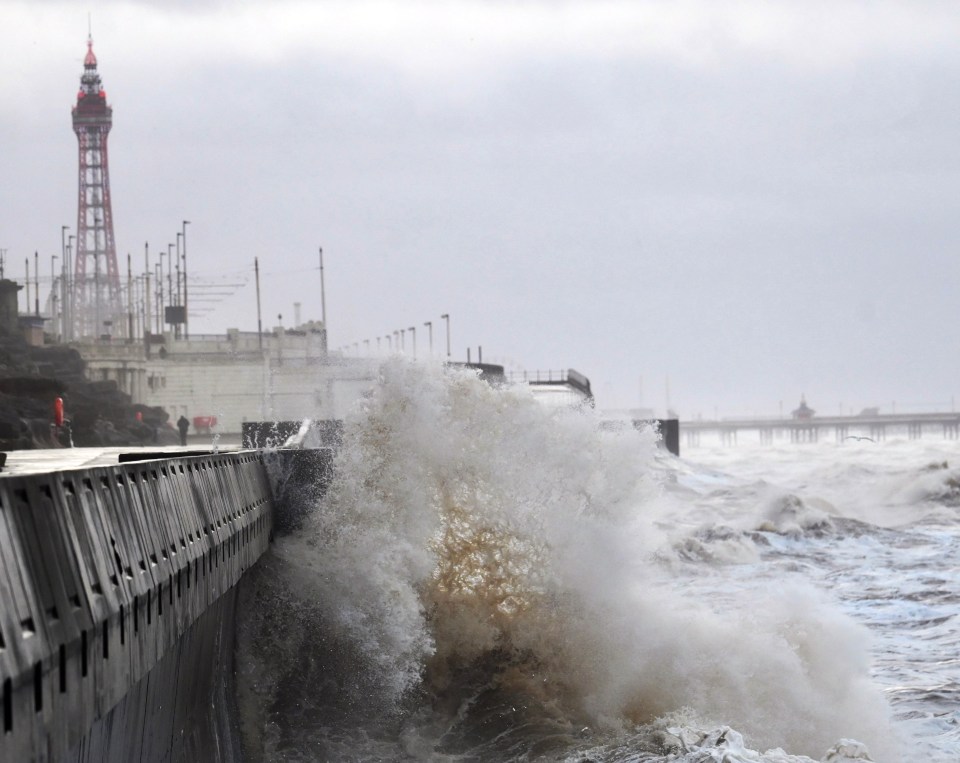 Waves crash into the sea wall on Blackpool's North Shore