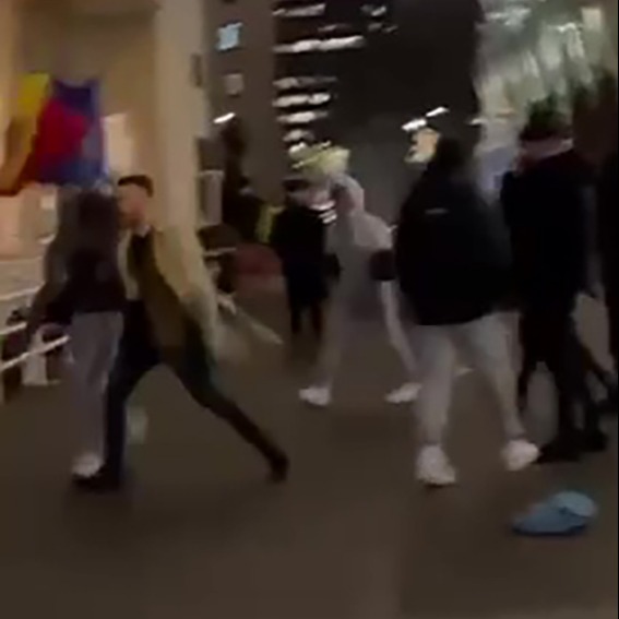 Exclusive video footage obtained by The Sun shows men waving a Romanian flag outside a central London restaurant