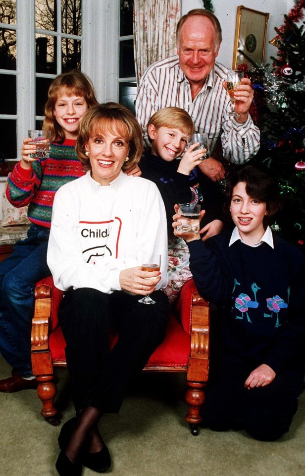 Esther with her husband Desmond and their three children in 1990