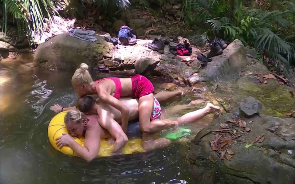 Sam Thompson wedged himself in between Josie Gibson and Danielle Harold on I'm A Celeb