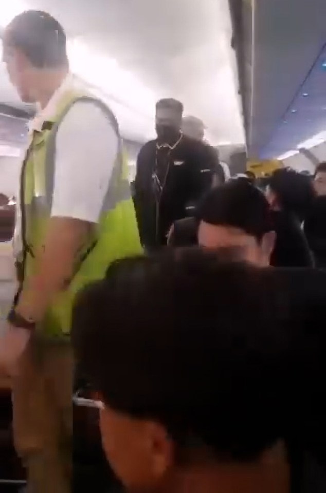 Many other passengers were seen whistling, filming and celebrating when the man was being dragged away but after the attack a child was heard crying