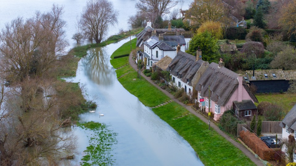 Houses in Holywell avoid flood water on Sunday after the Ouse burst its banks