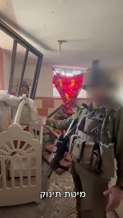 An IDF soldier could be seen giving a tour of the Gaza home after raiding it