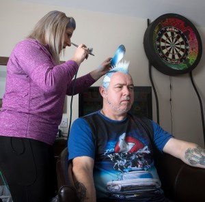 Times exclusive photographs of Peter 'Snakebite' Wright as his hairdresser wife Jo takes 3 hours to paint his tattoos to preview the World Darts at Alexandra Palace starting on Friday 13th December. Times exclusive PHOTOGRAPHS BY MARC ASPLAND