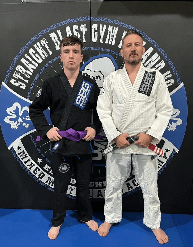 Kelly with Conor McGregor's head trainer John Kavanagh