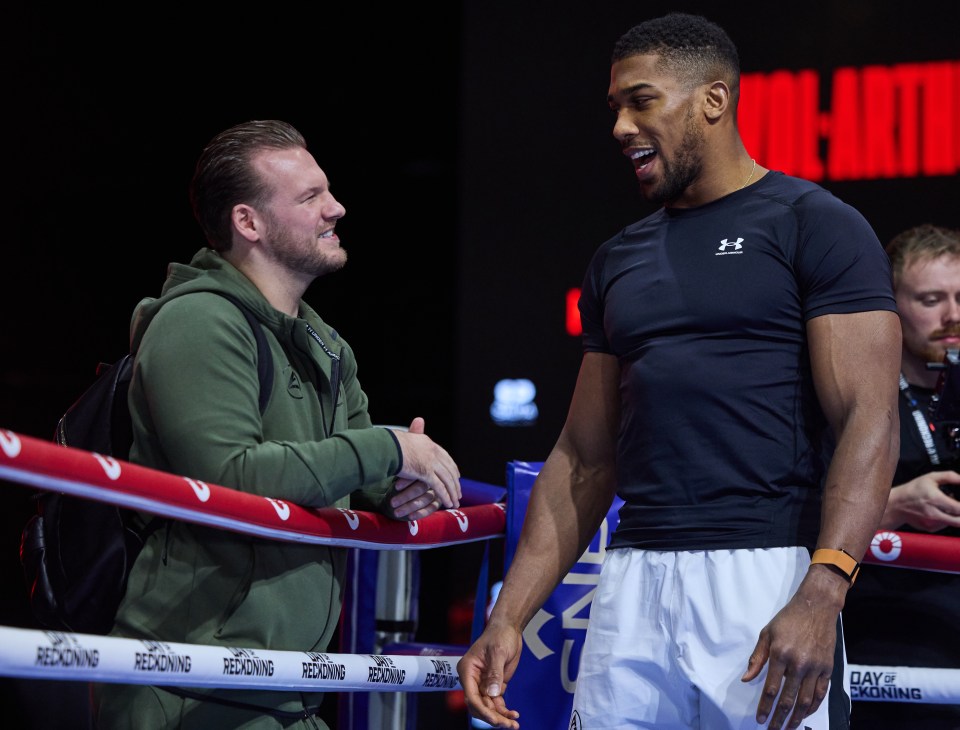 RIYADH, SAUDI ARABIA - DECEMBER 20: Anthony Joshua speaks to Trainer Ben Davison during todays Media Workouts on December 20, 2023 in Riyadh, Saudi Arabia. (Photo by Mark Robinson/Matchroom Boxing via Getty Images)