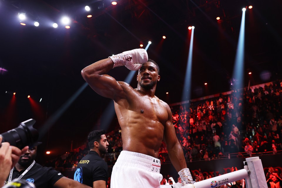 RIYADH, SAUDI ARABIA - DECEMBER 23: Anthony Joshua celebrates victory following the Heavyweight fight between Anthony Joshua and Otto Wallin during the Day of Reckoning: Fight Night at Kingdom Arena on December 23, 2023 in Riyadh, Saudi Arabia. (Photo by Richard Pelham/Getty Images)