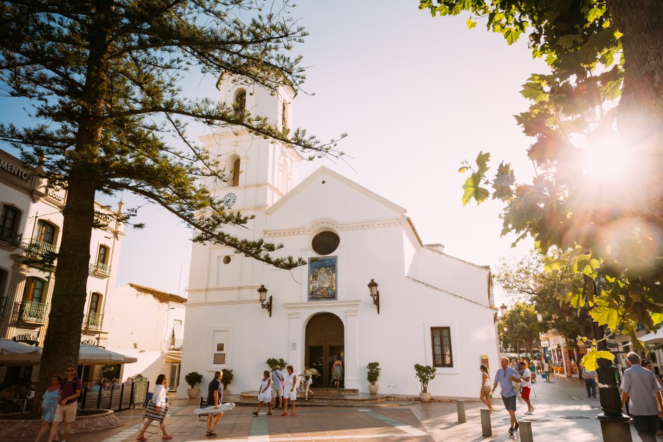 Balcon de Europa is an expansive, cliffside promontory featuring the 17th-century Church of El Salvador