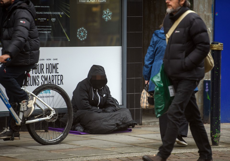 A homeless man in Gloucester city centre, where locals are complaining the problem is getting out of hand