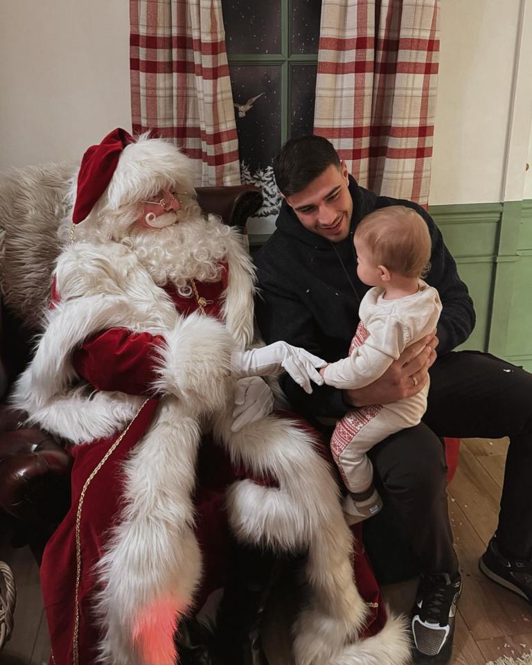 The couple were all smiles as the tot met him for the first time