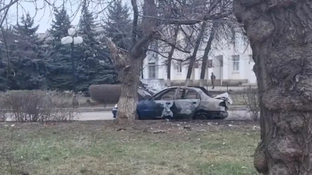 Popov's burned out car is seen after the bombing allegedly by Ukrainian spec ops