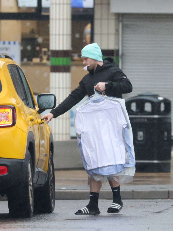 EXCLUSIVE: * Min Web Fee 30 GBP For Set * * Min Print Fees TBA * A Fresh Start! Danny Walters Picks Up Clean Laundry As He Is Seen For The First Time After Keanu Was Killed Off In The EastEnders Christmas Special. The actor, who has played Keanu Taylor on the BBC soap for six years, was spotted picking up some freshly cleaned clothes from a laundrette in east London. Danny exited EastEnders in dramatic fashion on Christmas Day after Keanu was stabbed in the back by Linda Carter. He has since commented that it's "time to wear a different costume". Pictured: Danny Walters Ref: SPL10657838 291223 EXCLUSIVE Picture by: SplashNews.com * Min Web Fee 30 GBP For Set * * Min Print Fees TBA * Splash News and Pictures USA: 310-525-5808 UK: 020 8126 1009 eamteam@shutterstock.com World Rights