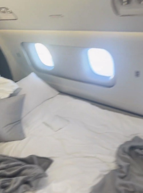 The jet contained a huge double bed that one of his daughters was sleeping in