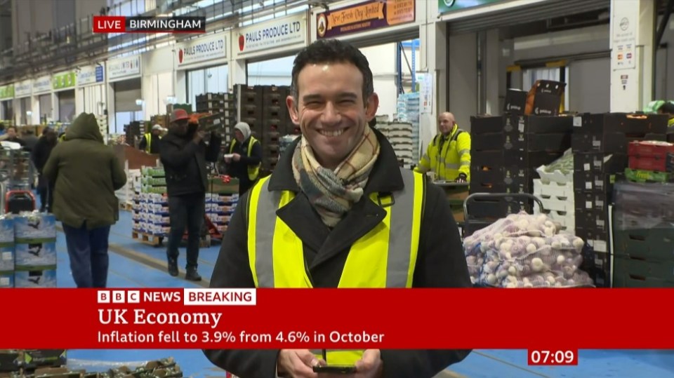 A BBC News reporter was left red-faced after being mistaken for shop staff during a live report