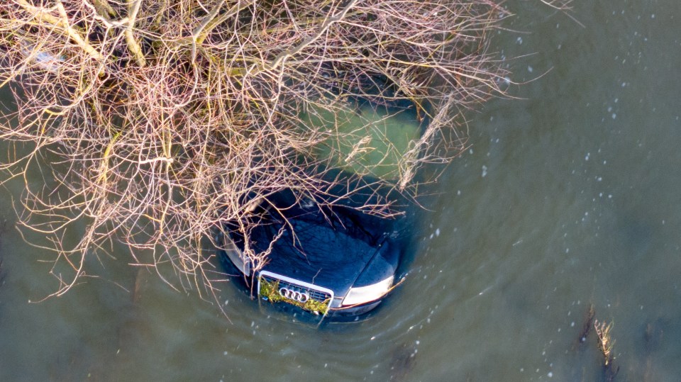 An Audi that got caught out on the flooded A1101 in Welney, Norfolk last week remained underwater today