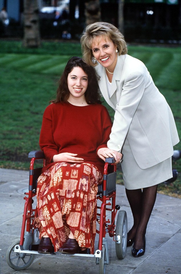 Esther with daughter Emily (now Miriam) in a wheelchair in 1991