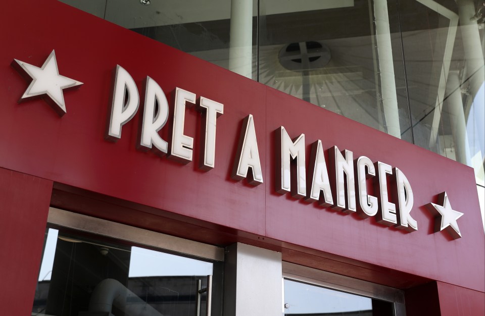 a red sign that says pret a mancer on it