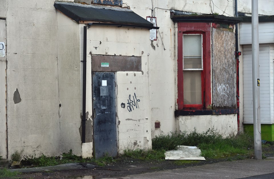 Boarded-up windows are common on residential streets