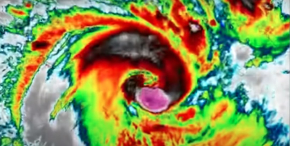 A weather map shows the intensifying hurricane sweeping towards Australia