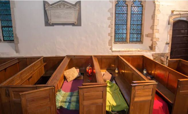 Guests have to bring their own bedding and sleep among the pews