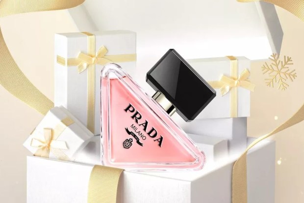 image of prada paradoxe perfume against wrapped boxes