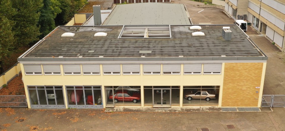 The abandoned Ford dealership is in Bavaria, Germany