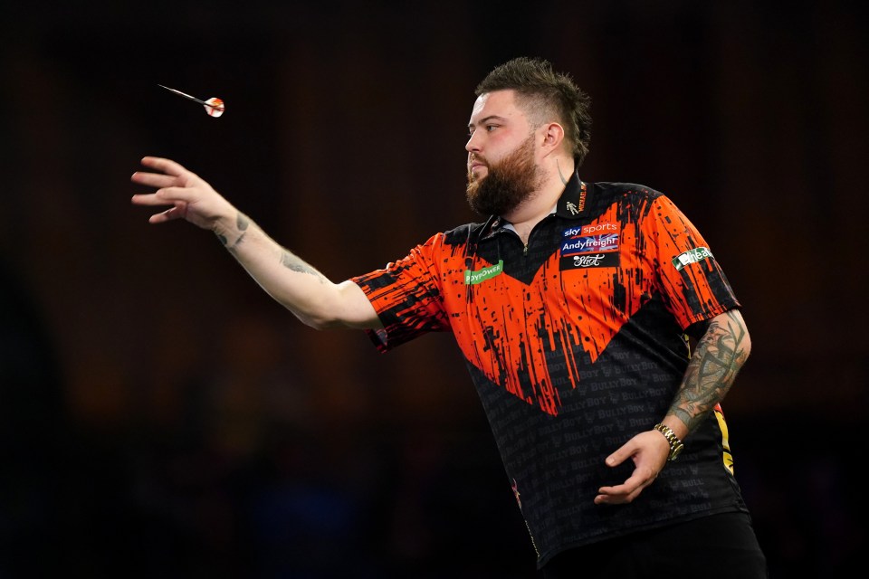 Champion Michael Smith crashed out to lose his world no1 ranking