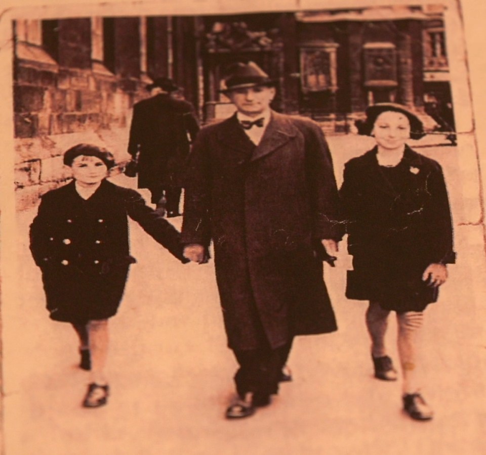 Ruth ( on the right) as a child with her father and brother