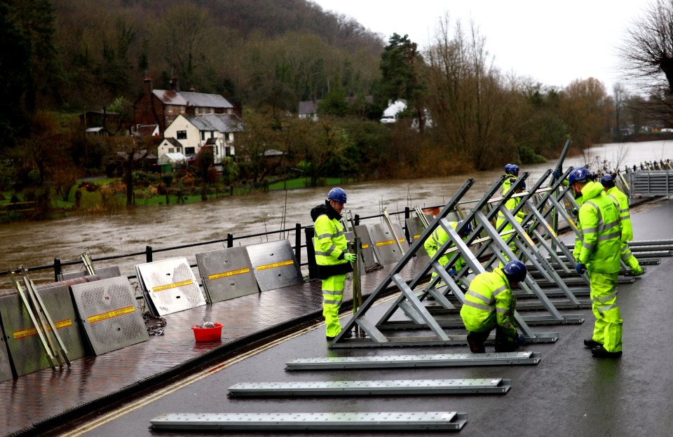 Environment Agency were seen erecting flood barriers along the River Severn in Ironbridge, Shrops, as Storm Gerrit rolled in