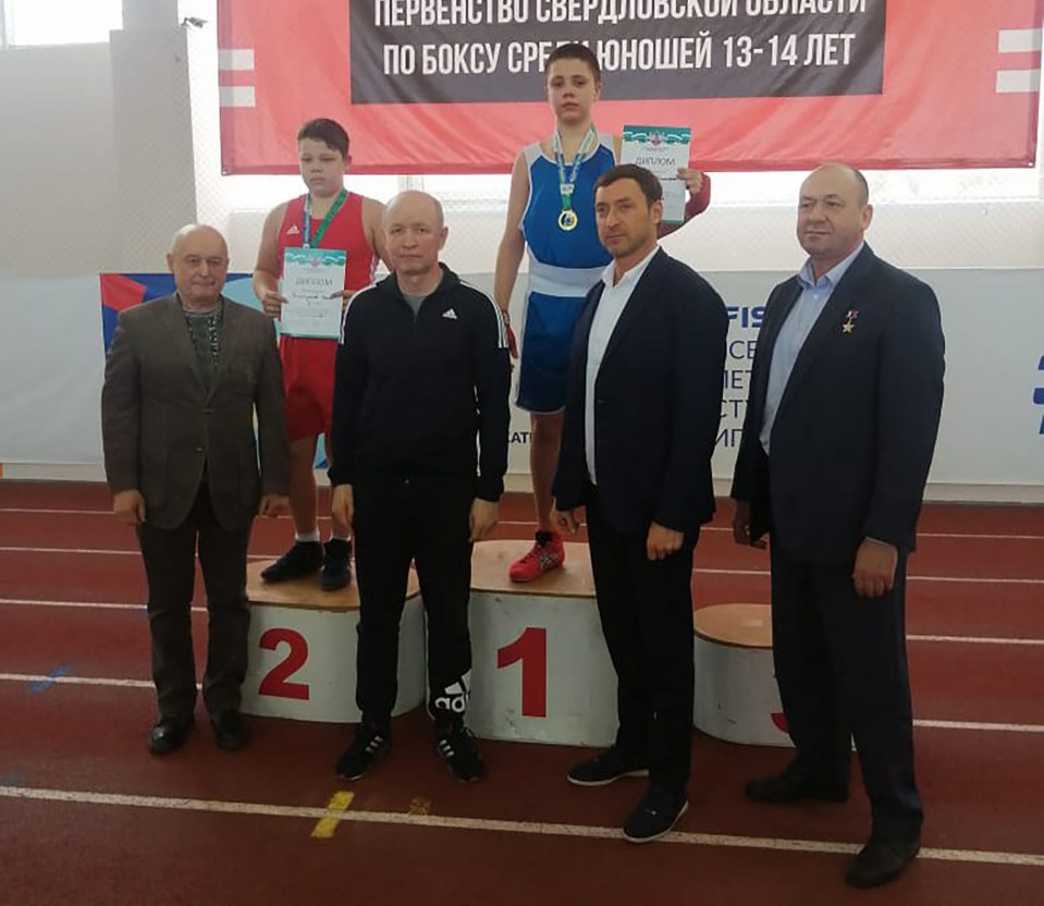 Timofey, right, was a gifted young boxer who had made it to the finals of a junior competition