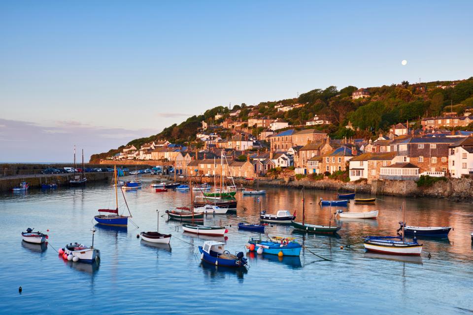 Cornwall has lots to offer in the winter months - pictured, the scenic fishing village of Mousehole