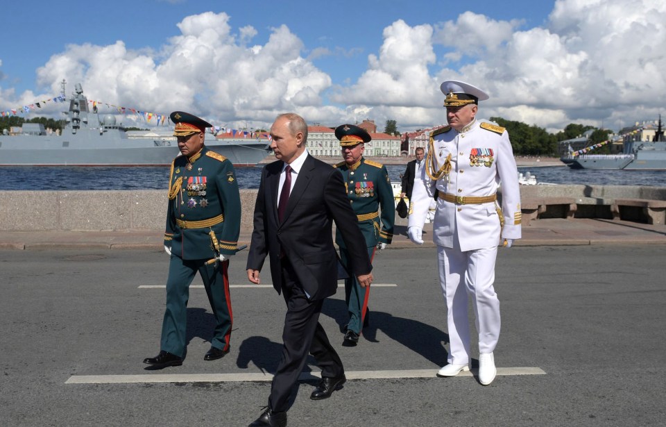 Admiral Nikolay Yevmenov, Commander-in-Chief of the Russian Navy, right, tried to call for two days of official mourning