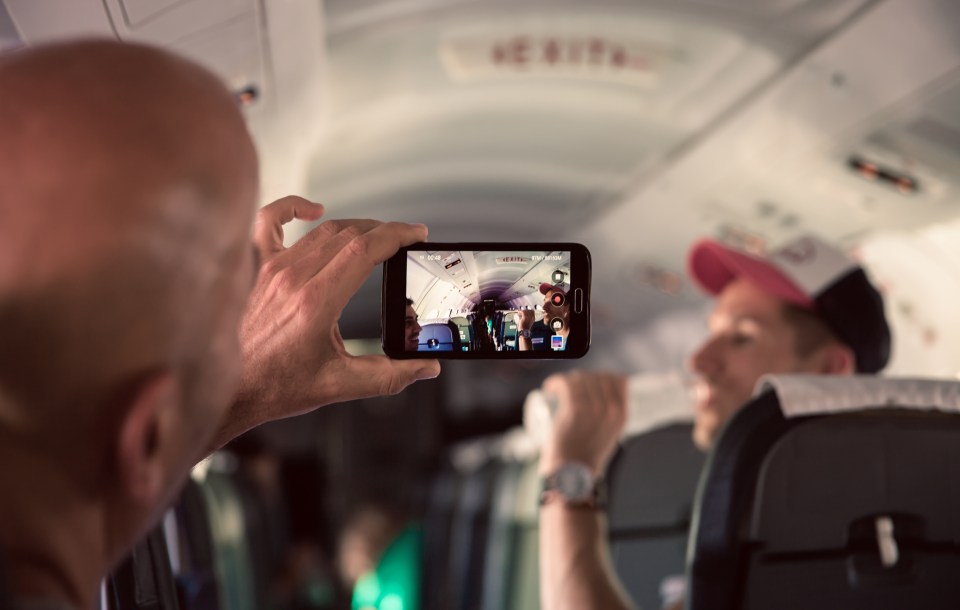 Passengers must seek permission before taking pictures of people or cabin crew