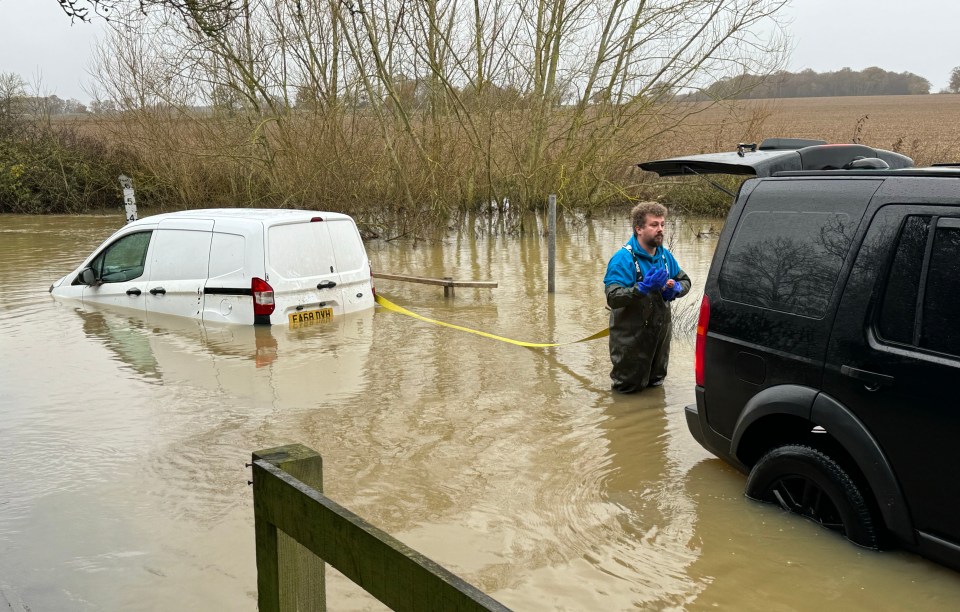 One van was abandoned and later towed after becoming submerged in three feet of floodwater at Buttsbury, Essex, on Sunday